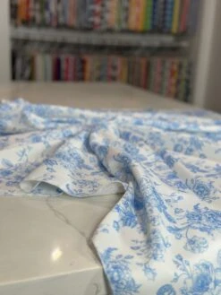 French Toile (Poly Print) Table Linen In Lt Blue -Urquid Linen Shop PhotoJul172023 115625AM